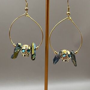 Gold Skull Earrings with Blue Accents